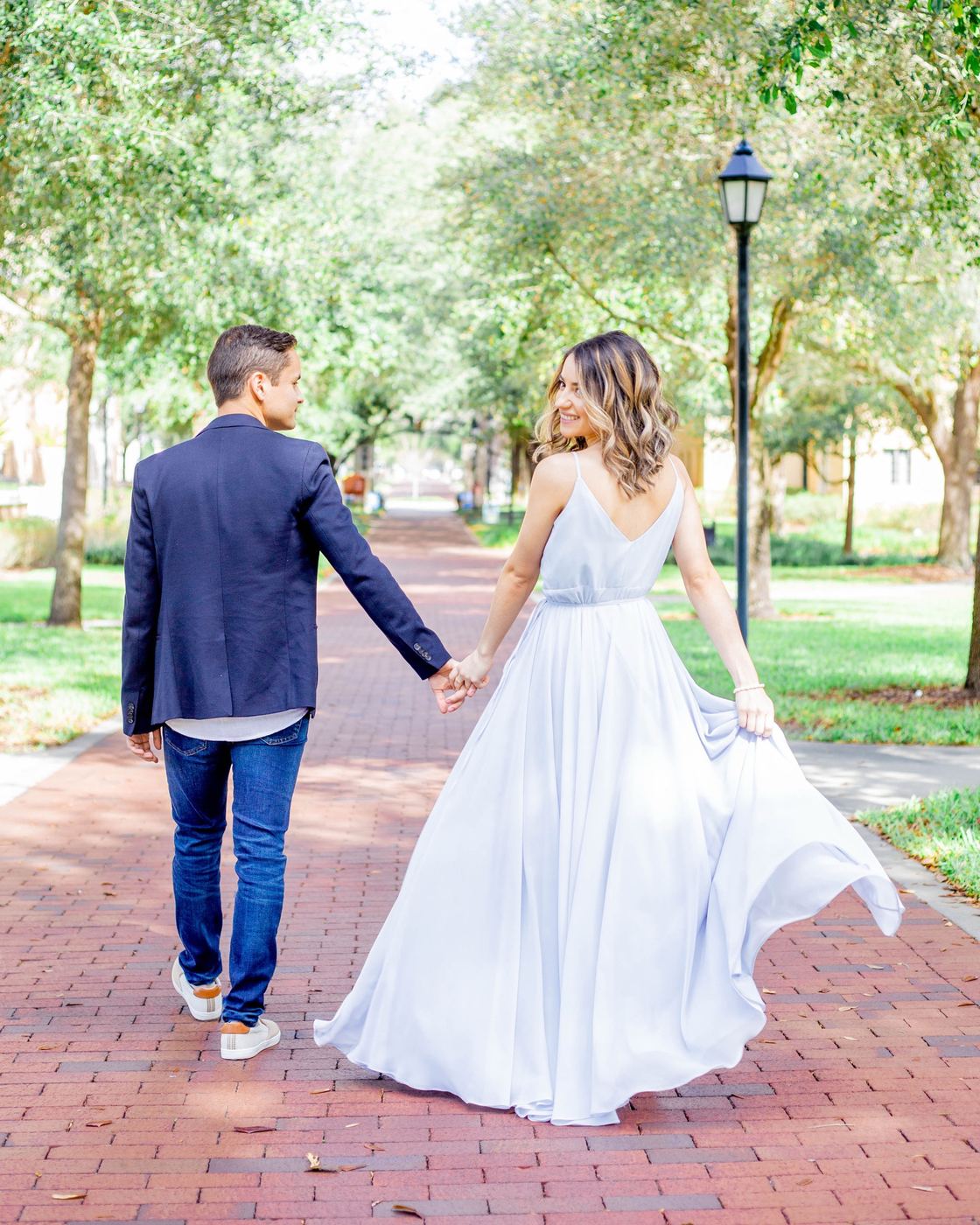 Brick path stroll: A flowing gown and an easy walk.