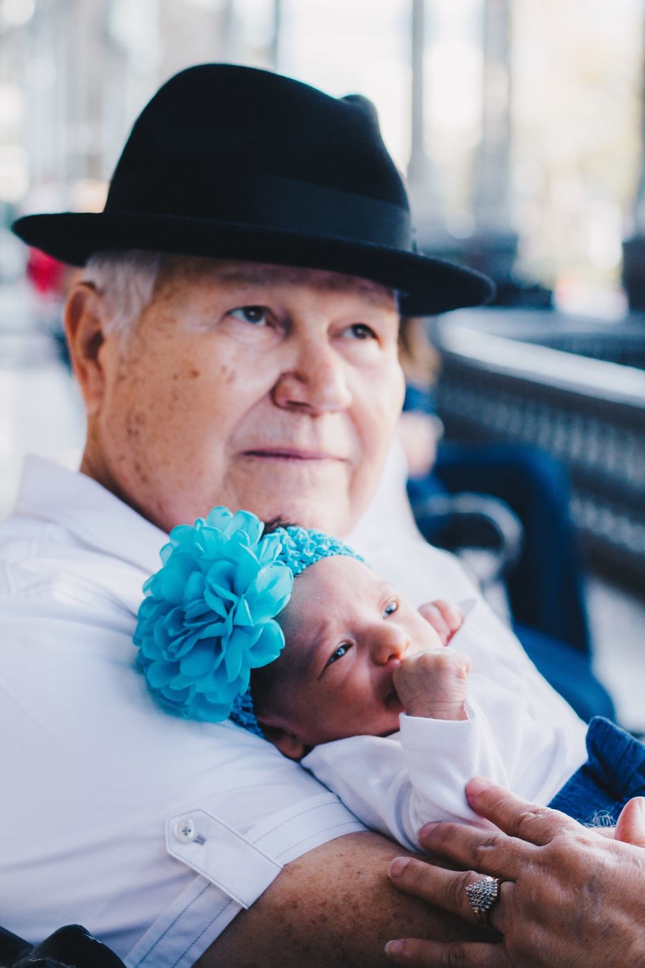 Generations: A grandfather and his newest granddaughter.