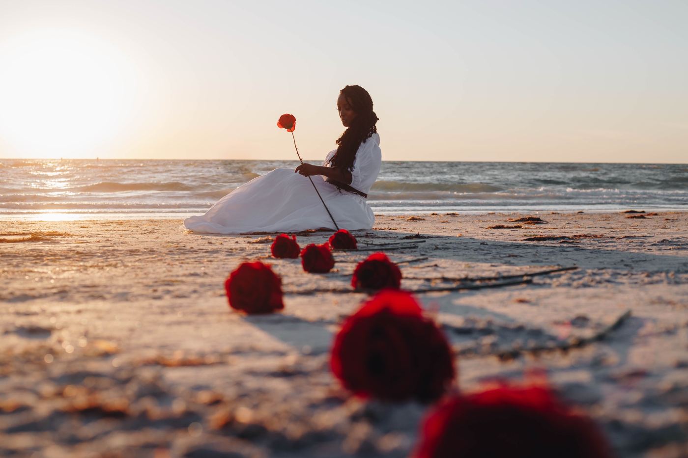 Roses at sunset: A styled beach portrait on the Gulf Coast.